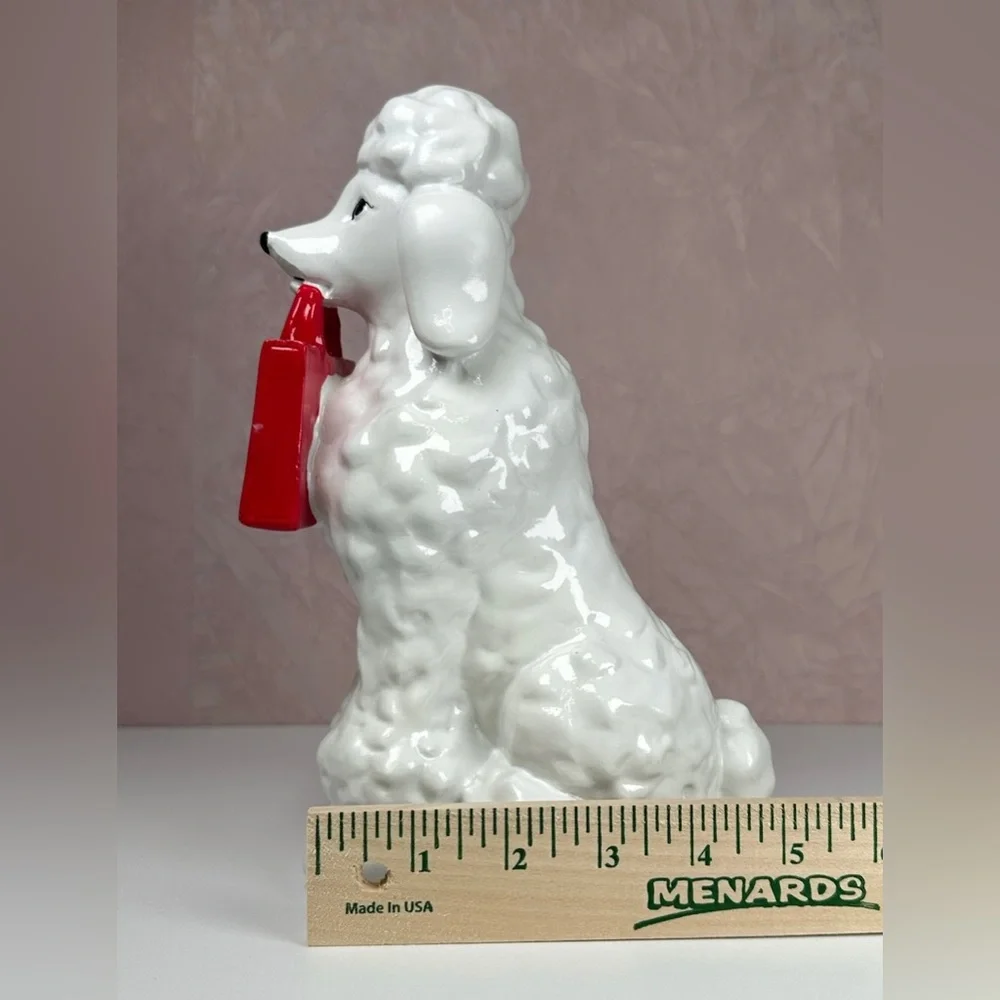 HomeGoods White Poodle Figurine with Red HomeGoods Bag